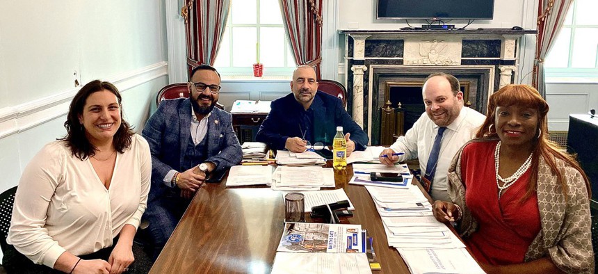 Frank Carone in a meeting with Council Member Francisco Moya, Ingrid Lewis-Martin, and Menashe Shapiro.  