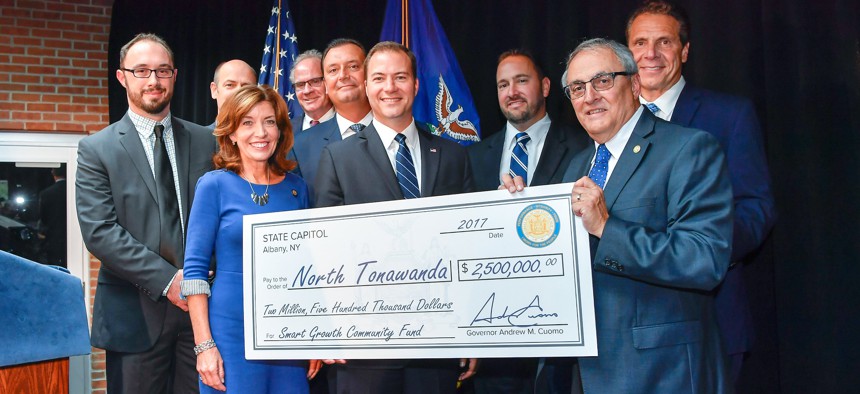 Former Gov. Andrew Cuomo distributes funds to North Tonawanda as part of the “Buffalo Billion II” initiative in 2017.