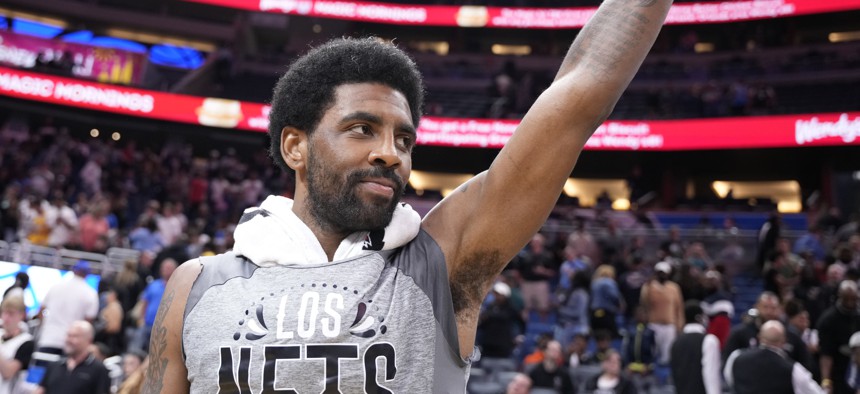 Kyrie Irving of the Brooklyn Nets is among the athletes not vaccinated allowed to return to the game. 