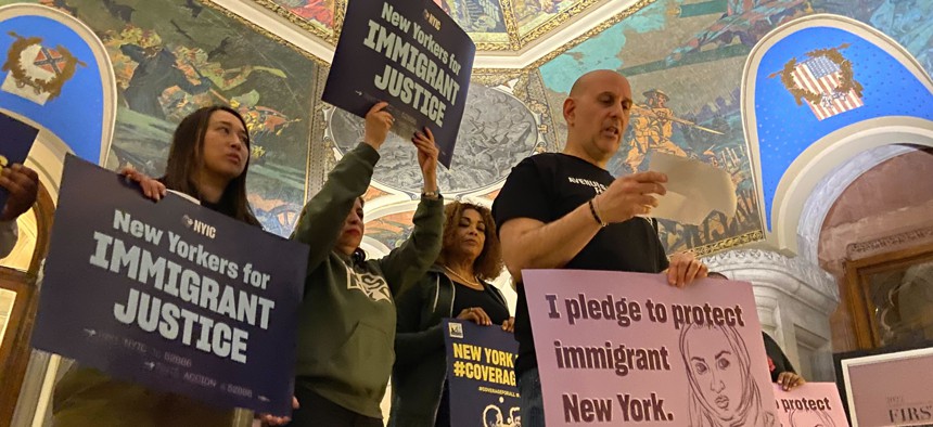Assembly members spend Tuesday night in the War Room in the state Capitol to raise awareness of a proposal to expand health care access for undocumented people via the state budget.