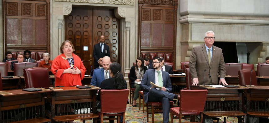 State Senate Majority Finance Chair Liz Kruger (left) and State Senate Minority Finance Chair Thomas O'Mara debate budget bills.