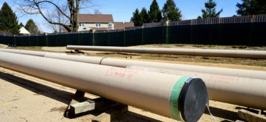 Protective boundaries divide a residential area and the Mariner East 2 pipeline construction site in West Chester.