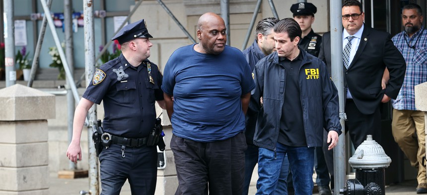 Suspect Frank James being taken into custody by the NYPD on April 13.