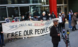 Activists protesting against the conditions at Rikers Island.