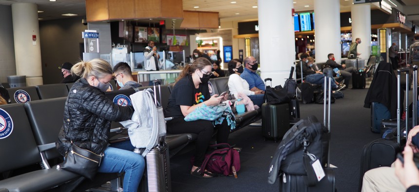 Travelers at Philadelphia International Airport.