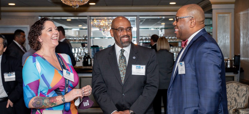 Dr. Angela Perez-Johnston shares a laugh with CCAC President Quintin Bullock and Pittsburgh Public Schools Superintendent Wayne Walters.