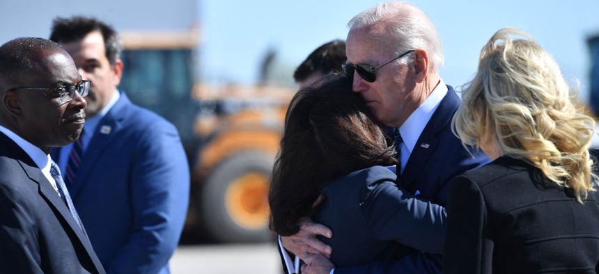 President Joe Biden embraces Gov. Kathy Hochul after disembarking Air Force One in Buffalo this week.