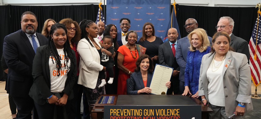 Gov. Kathy Hochul signing legislation to strengthen New York's gun laws.