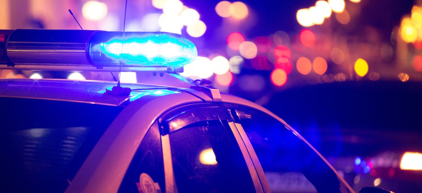 A police car and flashing lights