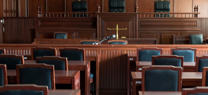 An empty courtroom seen from the back