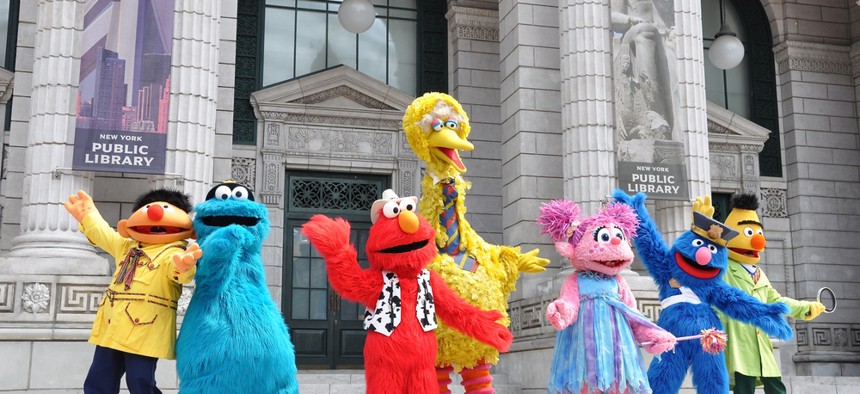 Sesame Street characters on the street