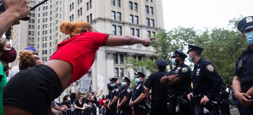 Protester and police during George Floyd protest in New York City. 