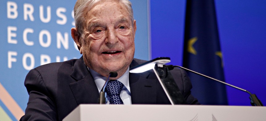 George Soros at event.