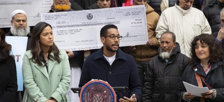 New York City elected officials including Councilman Antonio Reynoso and advocates gather on New York City Hall steps to support bills for nonprofits