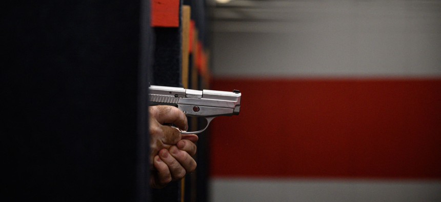 A gun owner at a pistol range in Queens, NY.