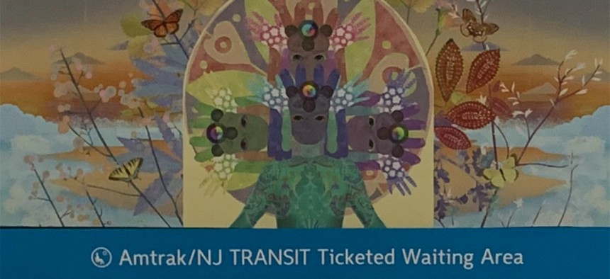 The Amtrak waiting area at Penn Station last week featured transit art by Saya Woolfalk.