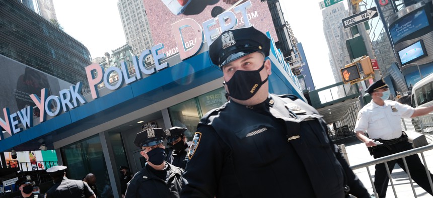 New York City Police officers pictured in Times Square, which will be designated a gun free zone when loosened concealed carry restrictions go into effect on Thursday.