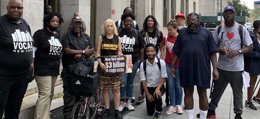 Protesters rally outside Tuesday's Board of Correction hearing.