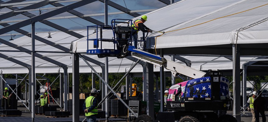 Construction of a tent facility to help temporarily house the recent influx of asylum-seekers is underway in the Bronx's Orchard Beach.