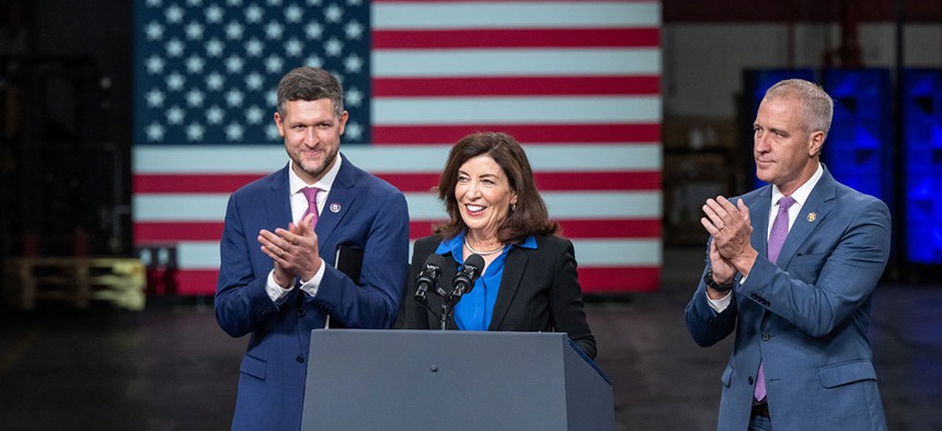 Gov. Kathy Hochul, flanked by Reps. Pat Ryan, left, and Sean Patrick Maloney, right, touts an IBM enterprise in Poughkeepsie.