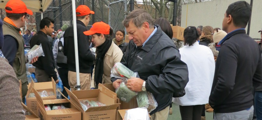 Judge Alex Calabrese (center) and others from the Red Hook Community Justice Center at work in the aftermath of Superstorm Sandy. 