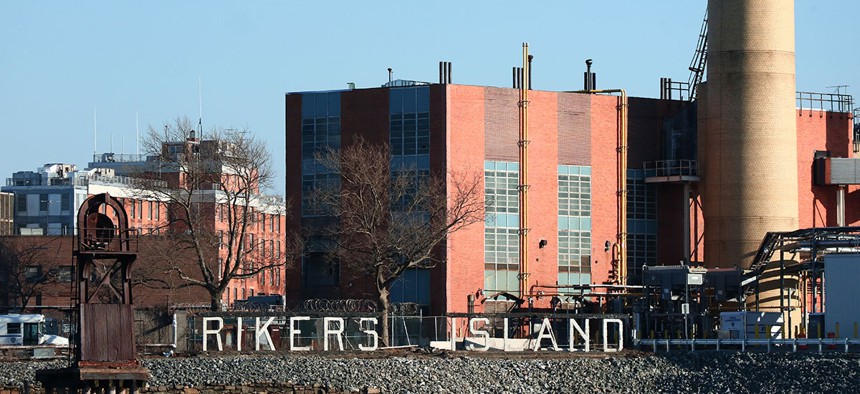 A sign marks the location of the Rikers Correctional Center in the East River in New York City.