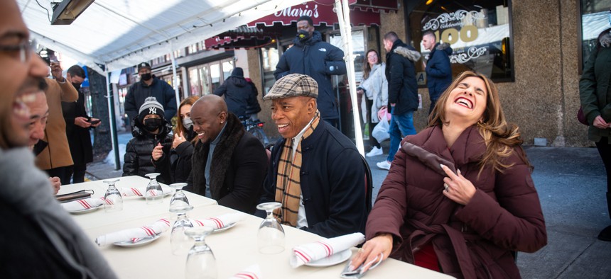 New York City Mayor Eric Adams dines with City Council members at Mario's on Arthur Avenue in the Bronx to show his support for outdoor dining.