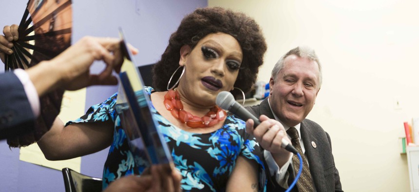 Former Council Member Danny Dromm participates in a drag story hour.