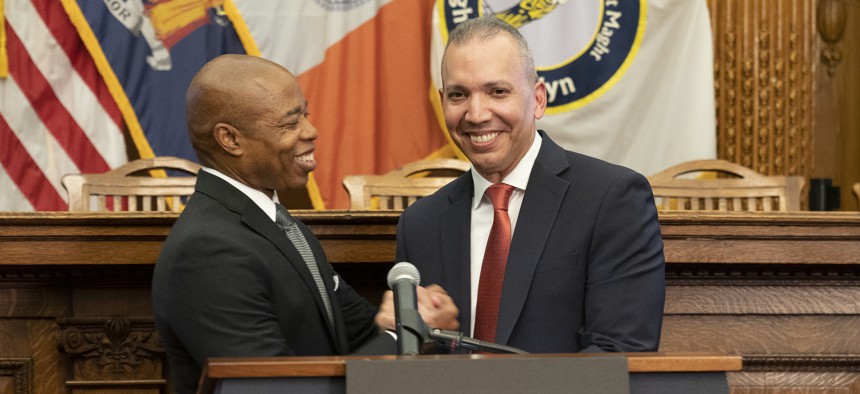 Then Mayor-elect Eric Adams congratulates Louis Molina as his pick for Department of Correction Commissioner at Brooklyn Borough Hall on Dec. 16, 2021.