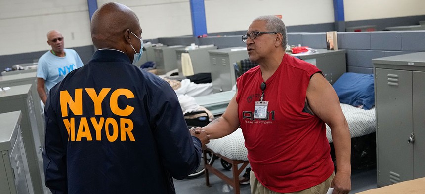 New York City Mayor Eric Adams visits a shelter for homeless veterans in Queens on Wednesday, November 9, 2022.