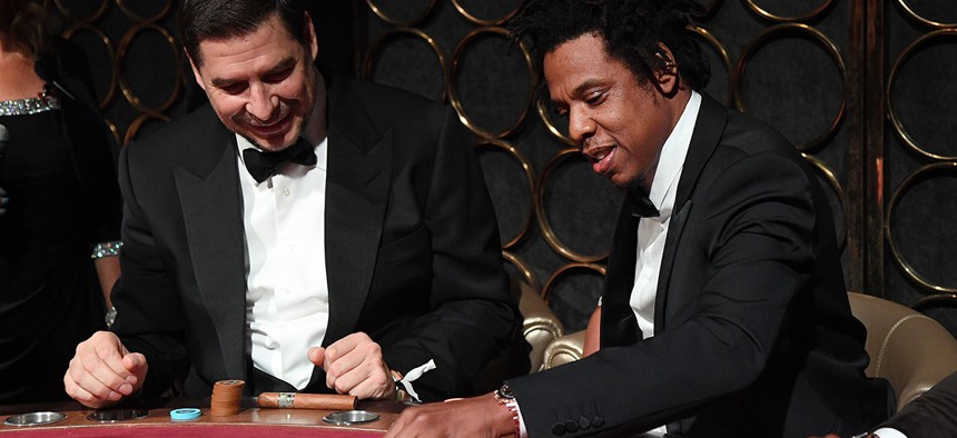 Jay-Z is in the running with Greenberg Traurig and SL Green to open up a casino in Times Square.
