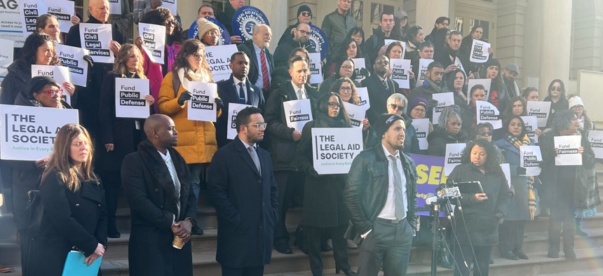 Public defenders and legal service providers rally for budget increases outside City Hall on March 20.