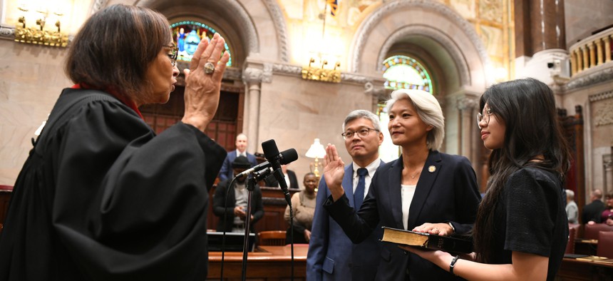 Senator Iwen Chu being sworn in as a NYS Senator before session on January 4, 2023.