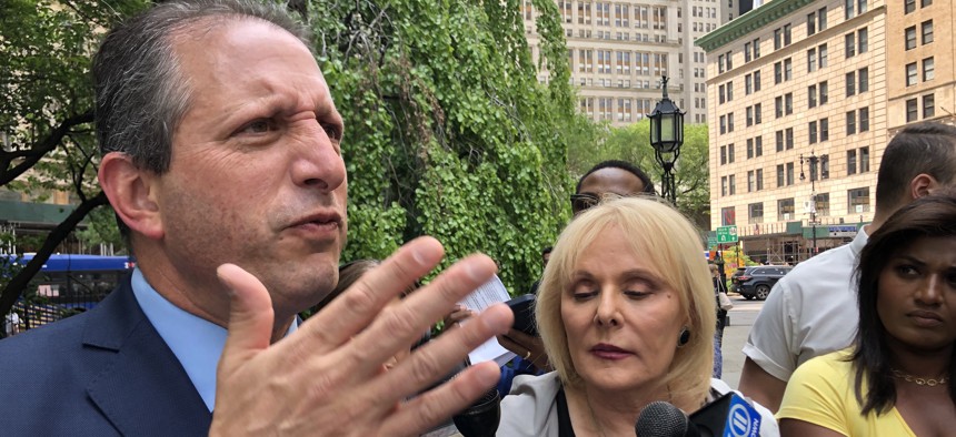 New York City Comptroller Brad Lander, speaking with reporters after a rally supporting asylum-seekers on May 11