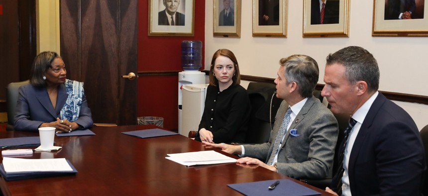 Actress Emma Stone met with state Sens. Andrea Stewart-Cousins, left, and Brad Hoylman-Sigal, center right.