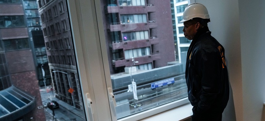 Mayor Eric Adams tours a former office building converted to housing at 160 Water St. in Lower Manhattan on March 13, 2023.