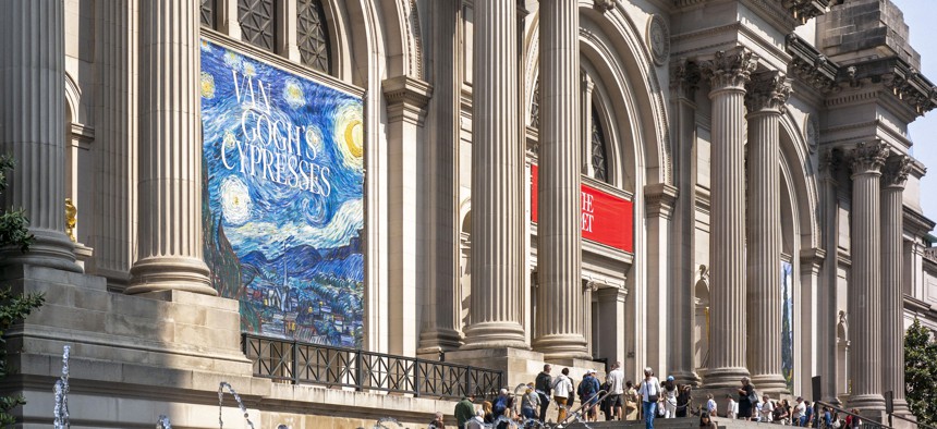 People line up to enter the Metropolitan Museum of Art for the media preview of "Van Gogh's Cypresses" exhibition on May 15, 2023.