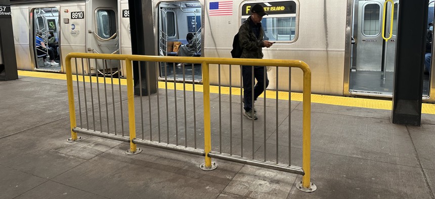 A subway barrier at 57th Street.
