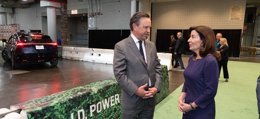 Governor Kathy Hochul with Justin E. Driscoll, Interim President and CEO NYPA at the Electric Vehicle test track at the 2022 New York Auto Show.