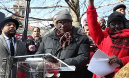 Manhattan Democratic Party leader Keith Wright spoke at the unveiling of the “Gate of the Exonerated” to honor the Central Park Five, of which Yusef Salaam is a member.