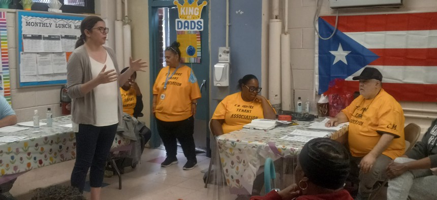 Bronx DA candidate Tess Cohen speaks to the E. R. Moore Tenant Association on June 21.