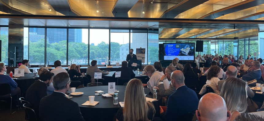 Attendees at City & State’s 2023 Protecting New York summit at the Museum of Jewish Heritage in Lower Manhattan Thursday listen as state Chief Cyber Officer Colin Ahern delivers the keynote speech at the event.