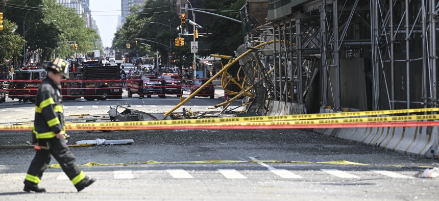 Debris from the crane collapse landed across 10th Avenue.