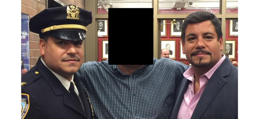 Edward Caban (left) with twin brother James Caban (right) and another police officer in 2015.