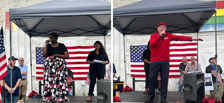 State Sen. Roxanne Persaud (left) and Curtis Sliwa address a rally against a proposed migrant shelter at Floyd Bennett Field on Aug. 24, 2023.