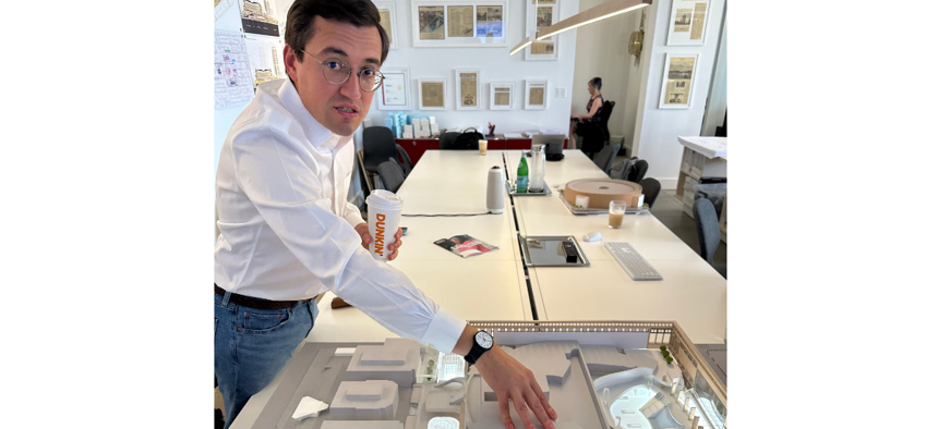 Peter Cipriano, ASTM North America’s senior vice president, shows a model of the redevelopment plan his firm has proposed for Penn Station.