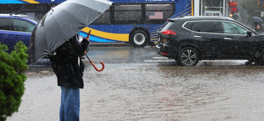 Flash flooding snarled the morning commute for New Yorkers, leaving some stranded in flooded intersections.