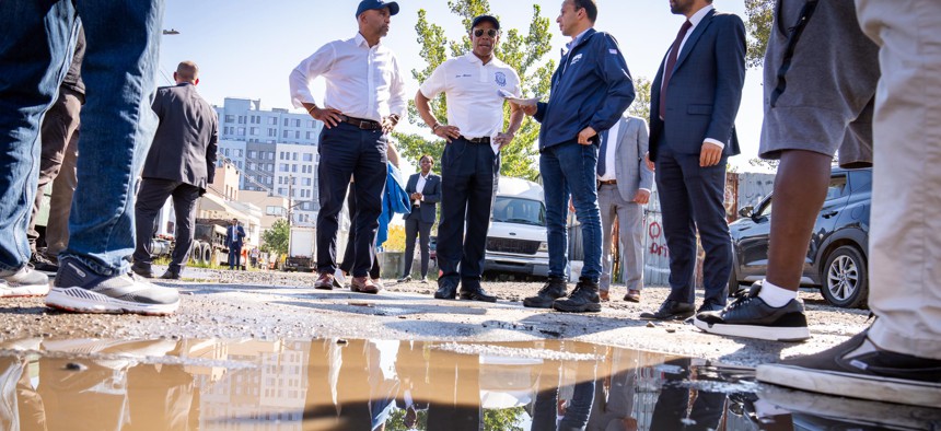 New York City Mayor Eric Adams visits the Jewel Streets neighborhood of Queens to evaluate flooding impacts and resiliency infrastructure on October 4, 2023.