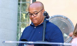 Assembly Member Eddie Gibbs speaks at The Children's Place on July 26, 2022.