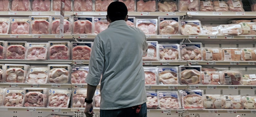 A customer shops at the produce section of a Manhattan market on Sept. 29, 2023 